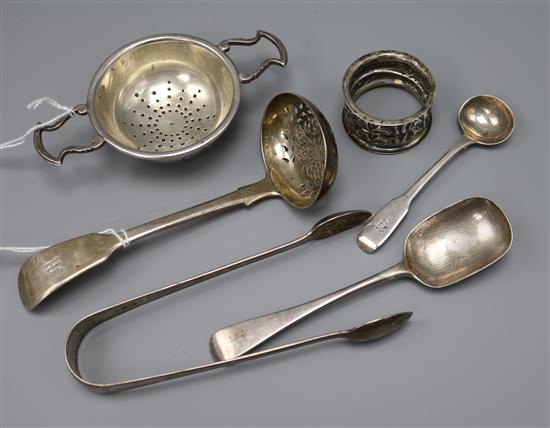 A Victorian silver fiddle pattern sifter spoon and five other items of small silver.